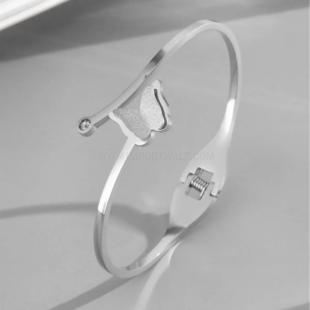 Frosted Butterfly Motif Titanium Steel Sleek Bangle