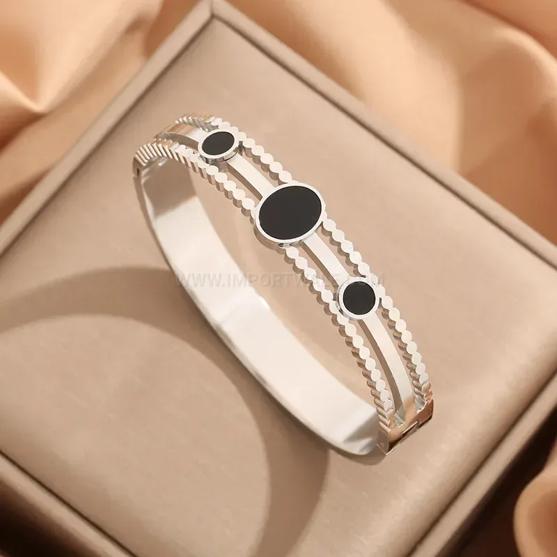 Hollow Polka Dot Black Shell Titanium Steel Bangle