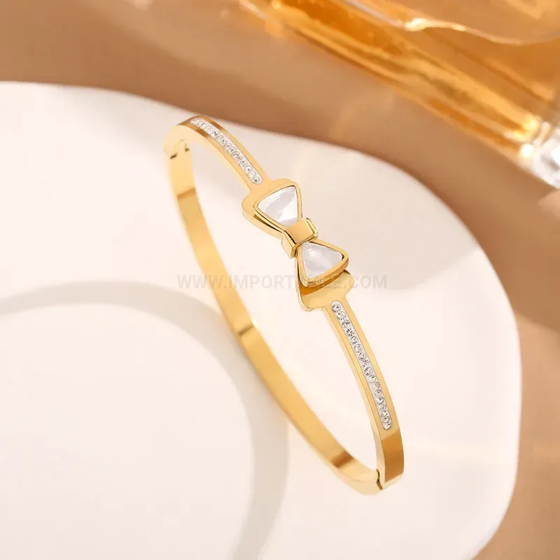 Double-Layer Faux Shell Bow Buckle Titanium Bangle