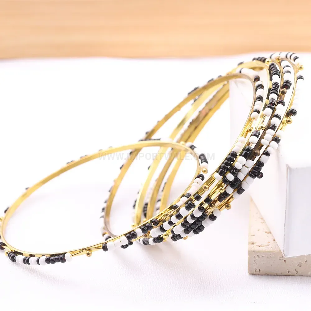 Elegant Black and White Beaded Gold-Plated Copper Bangle Bracelet