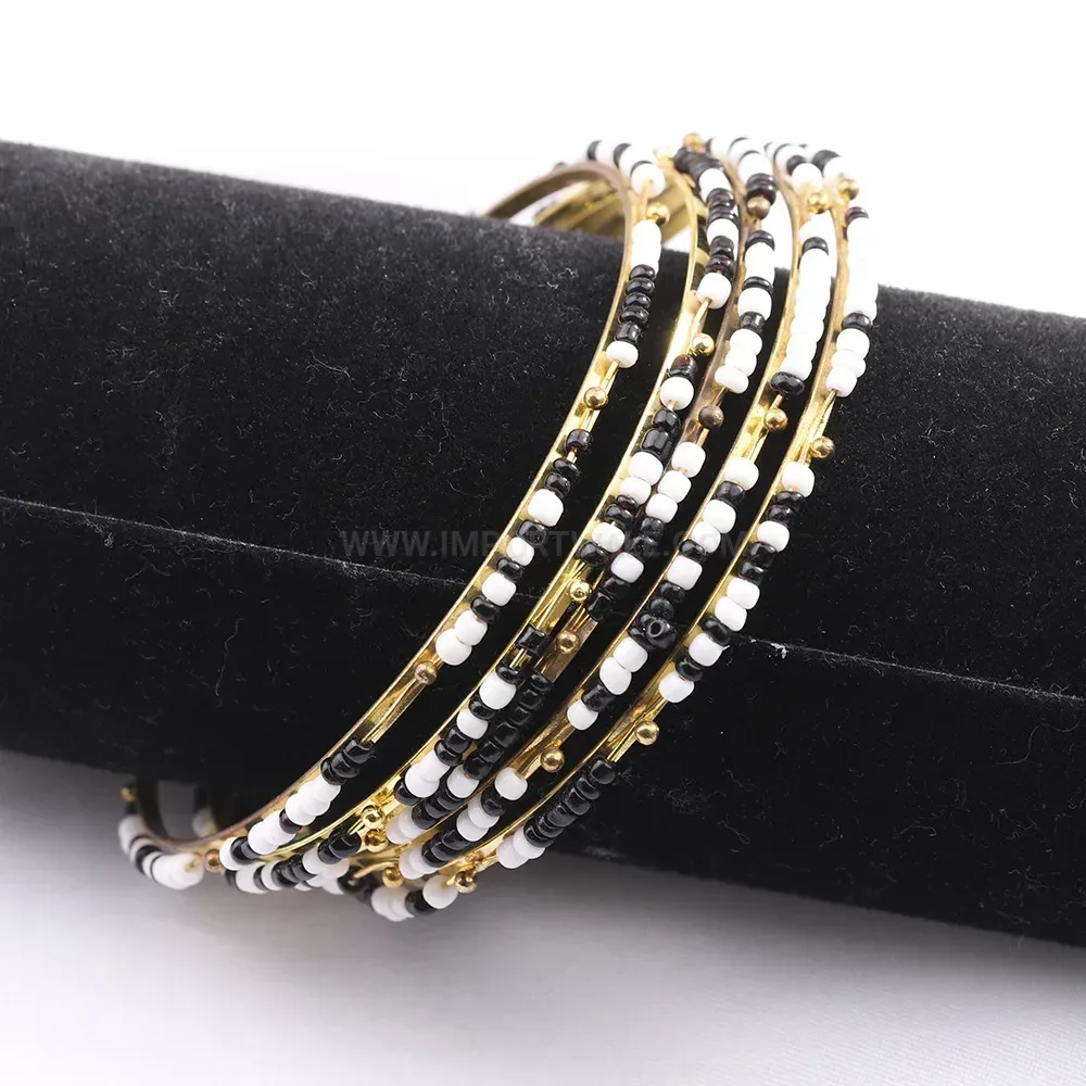 Elegant Black and White Beaded Gold-Plated Copper Bangle Bracelet