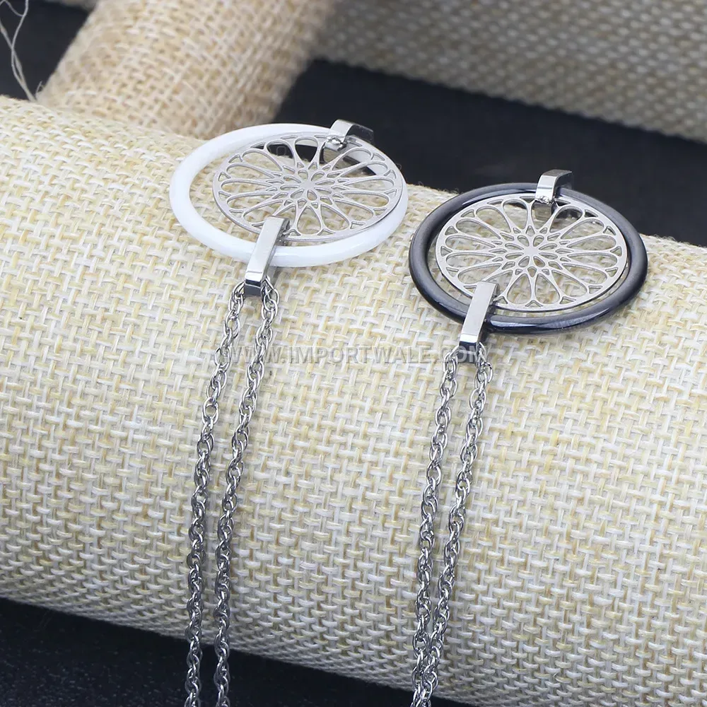 Stainless Steel and Ceramic Cutout Charm Bracelet