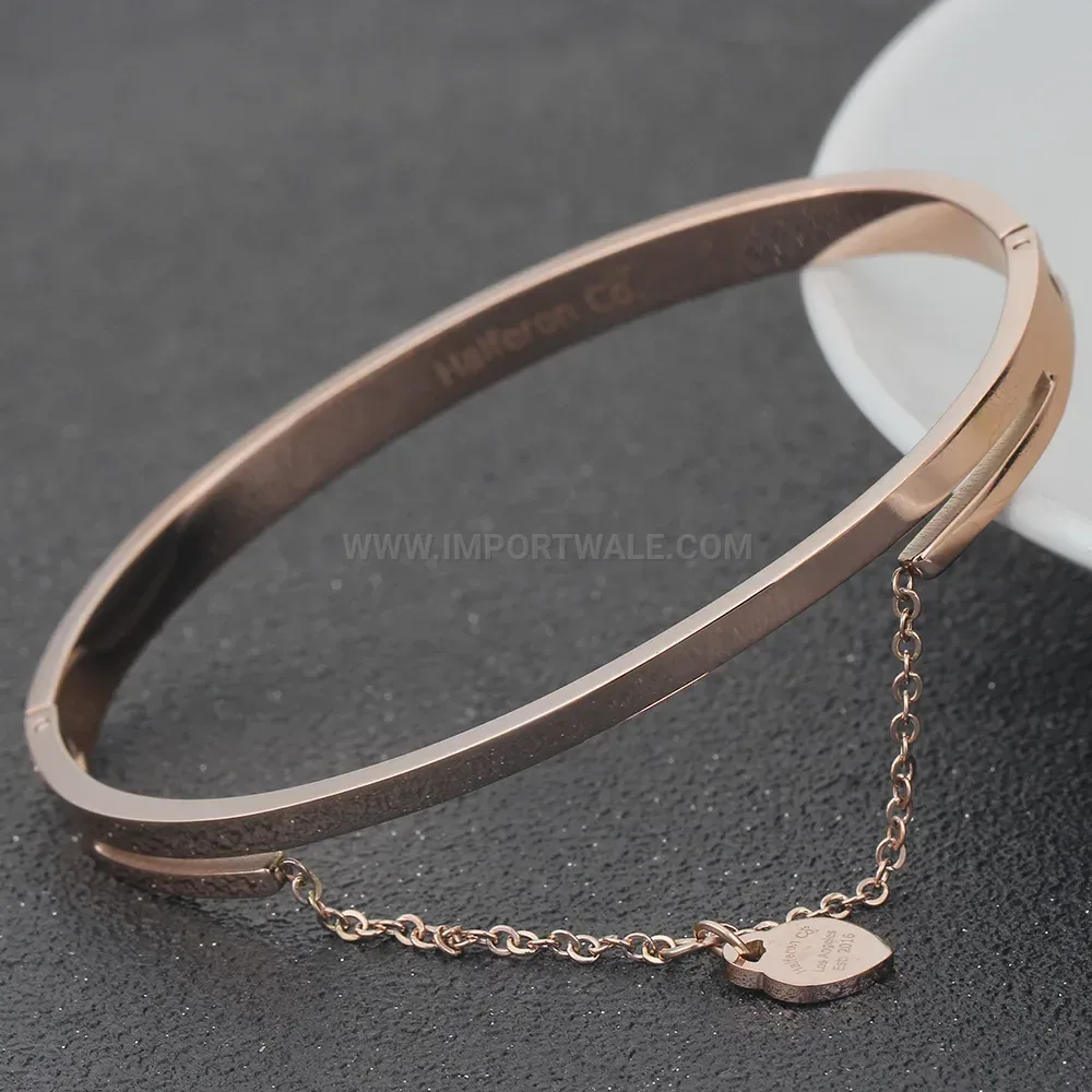 Modern Heart Accent Stainless Steel Bangle with Gold Plating