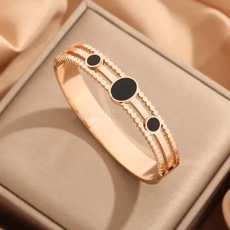 Hollow Polka Dot Black Shell Titanium Steel Bangle