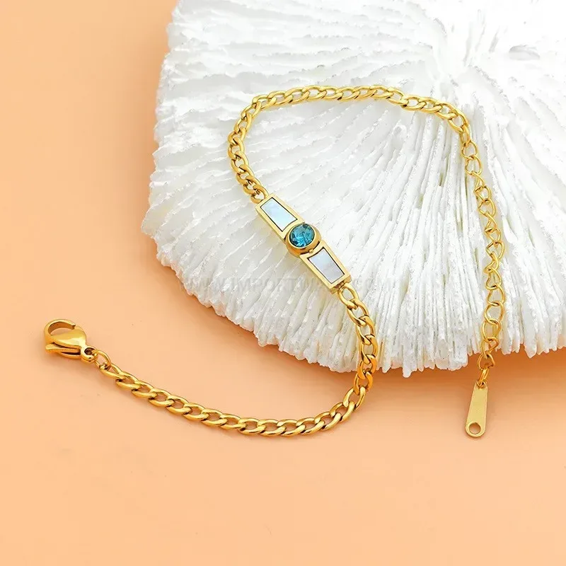 Blue Crystal Accent White Shell Stainless Steel Gold Bangle