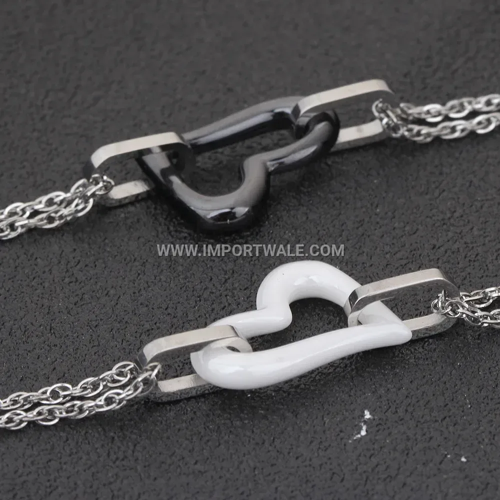 Stainless Steel and Ceramic Cutout Charm Bracelet