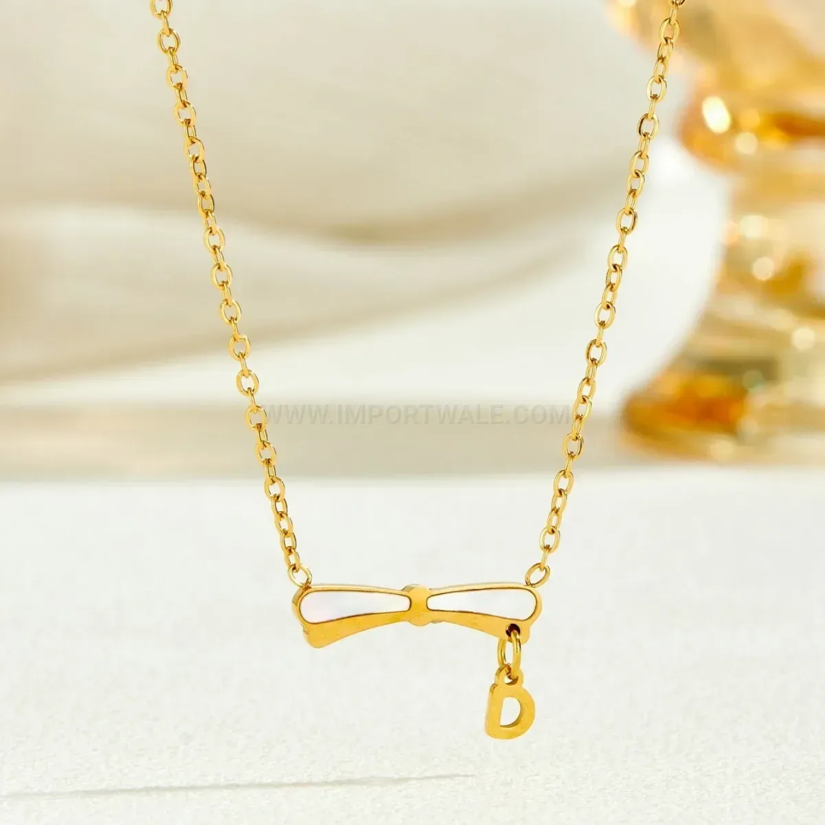 Trendy Delicate Gold Plated Ribbon Bow Pendant Stainless Steel Necklace