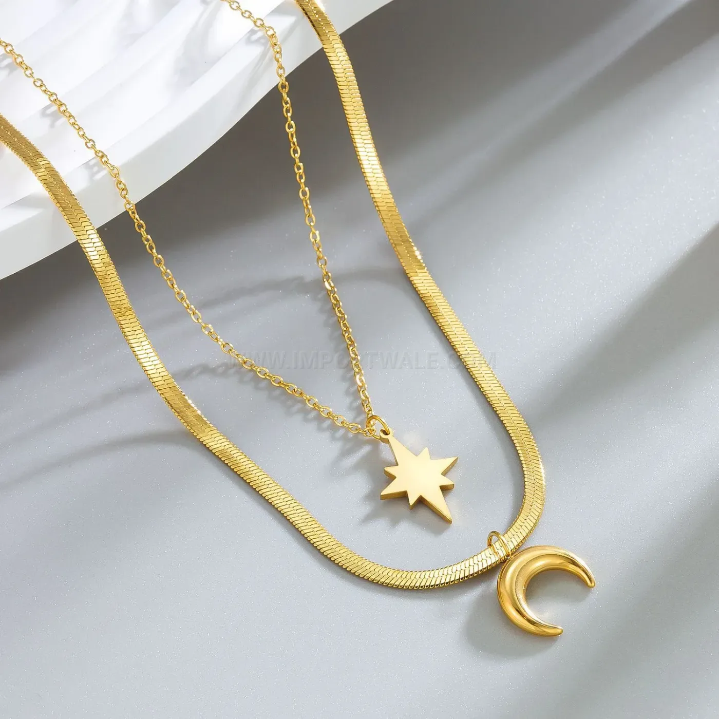 Bold Gold Layered Star and Moon Snake Chain Necklace