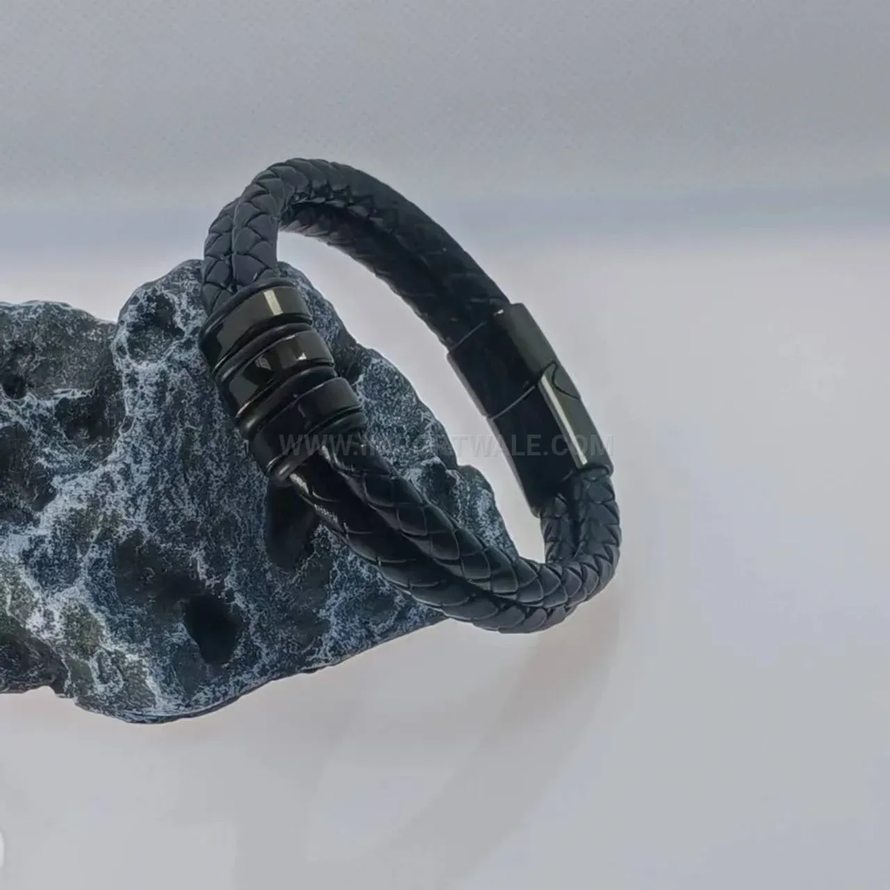 Handwoven Black Leather Bracelet with Polished Stainless Steel Accent