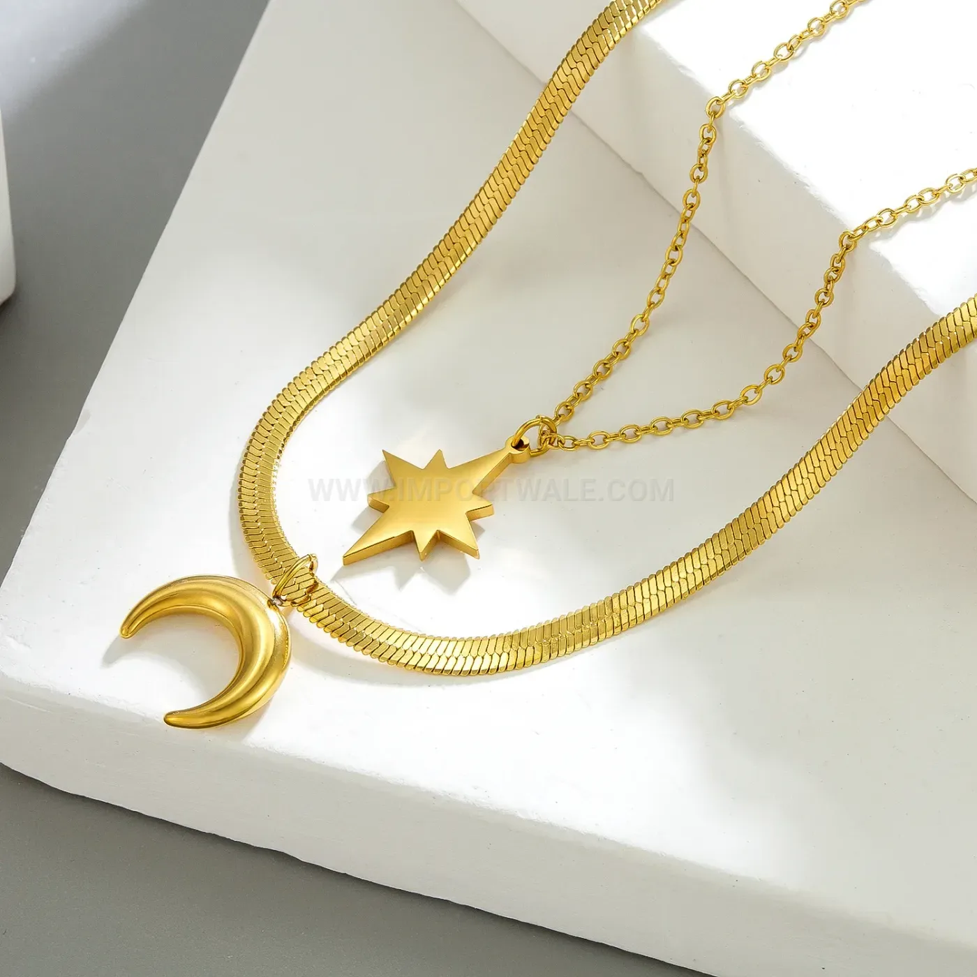 Bold Gold Layered Star and Moon Snake Chain Necklace