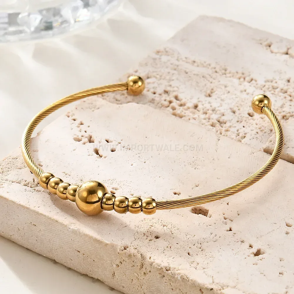 Chic Flexible Stainless Steel Cable Bangle With Symmetrical Round Bead Accents