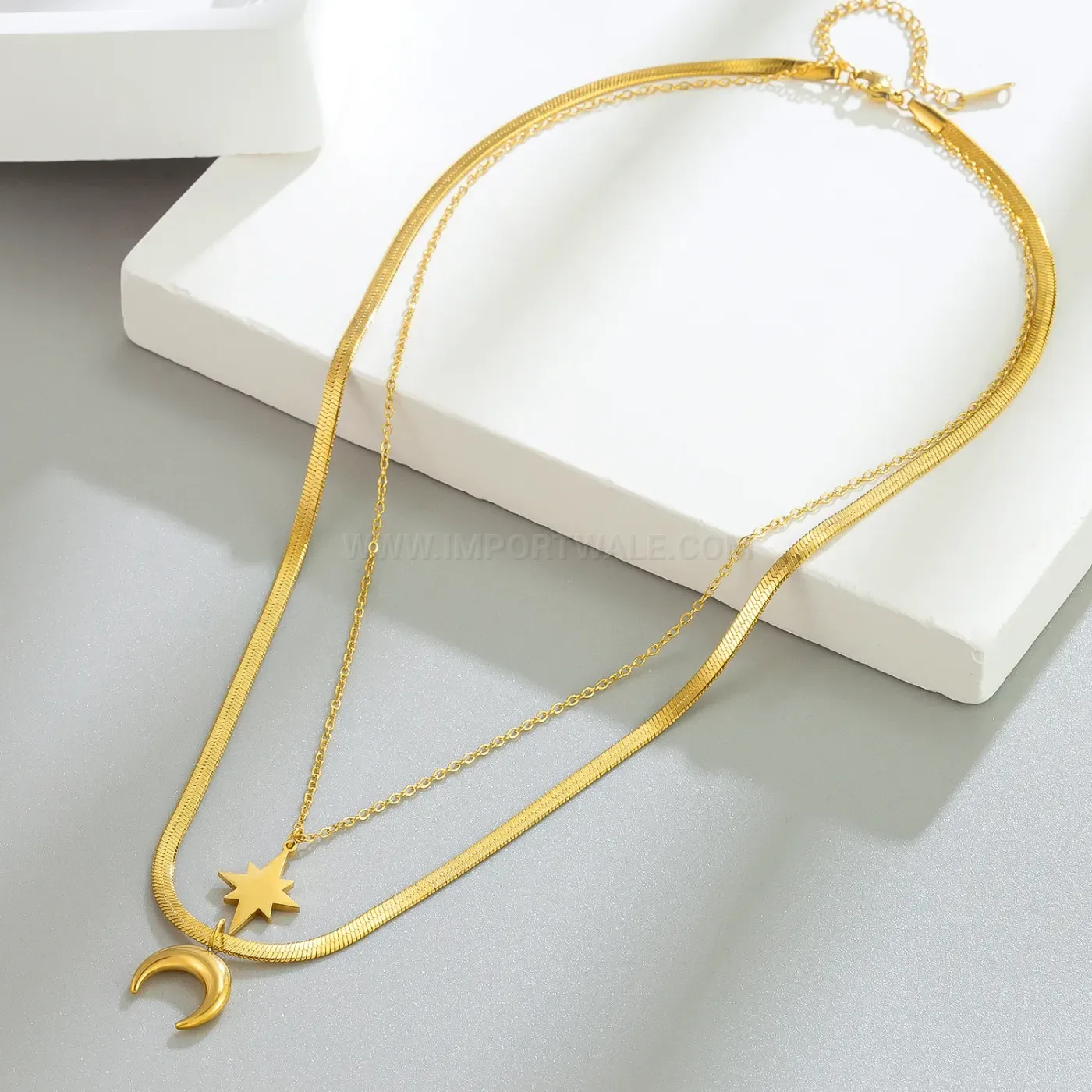 Bold Gold Layered Star and Moon Snake Chain Necklace