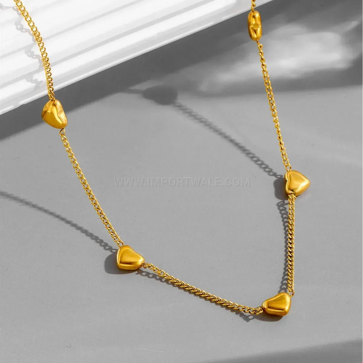 Four Heart Gold Plated Stainless Steel Charm Bracelet