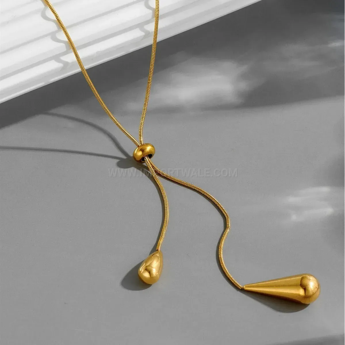 Designer Sleek Teardrop Stainless Steel Pendant Necklace and Earrings Set
