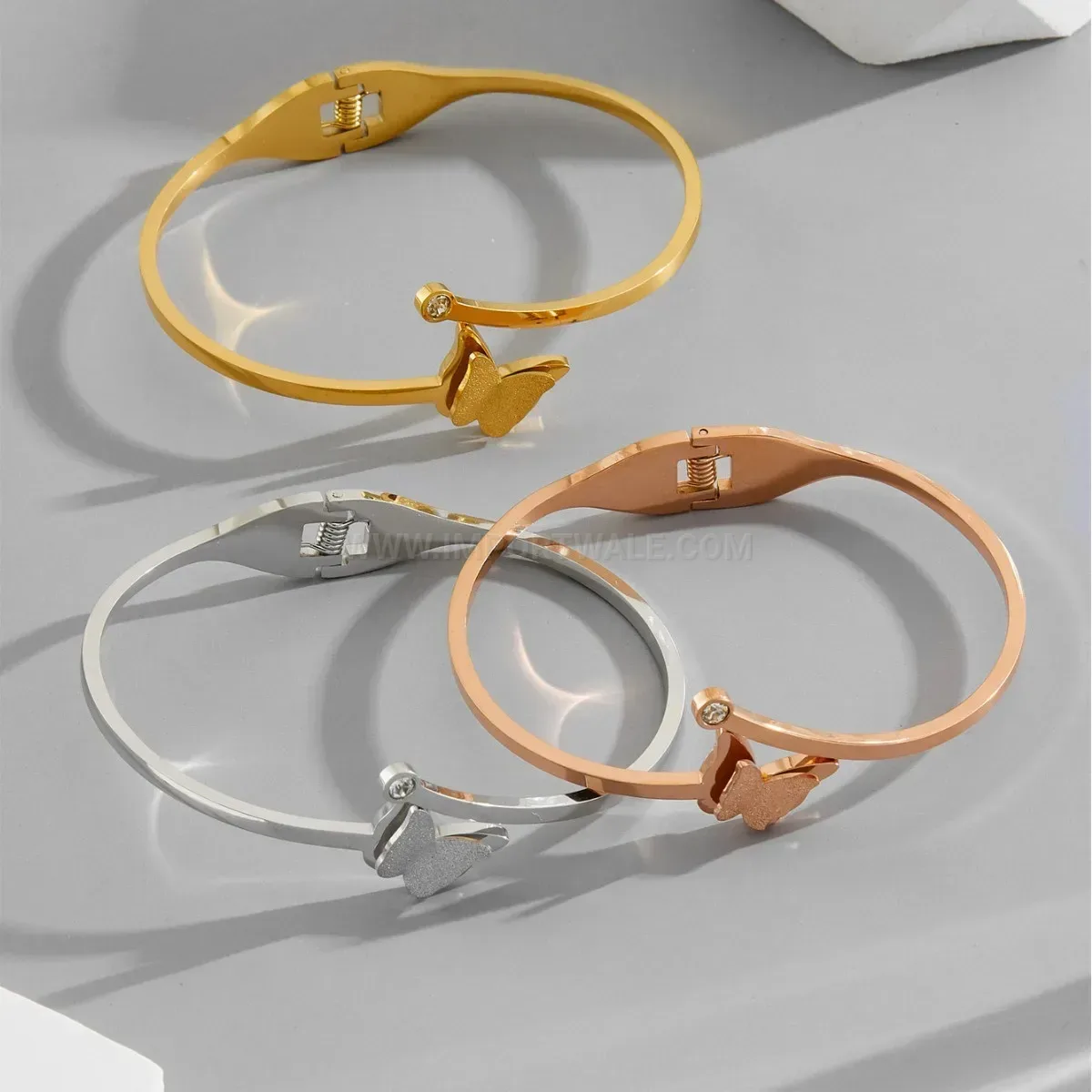 Frosted Butterfly Motif Titanium Steel Sleek Bangle