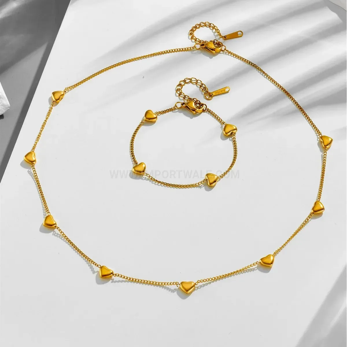 Four Heart Gold Plated Stainless Steel Charm Bracelet