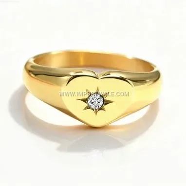 Eighteen Karat Gold Plated Stainless Steel Heart Starburst Ring
