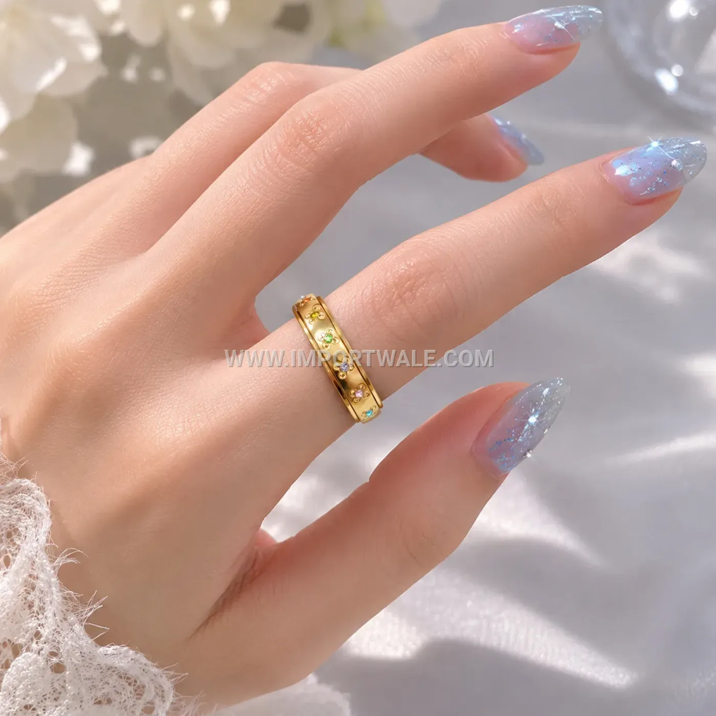 Spinning Floral Motif Stainless Steel Band Ring