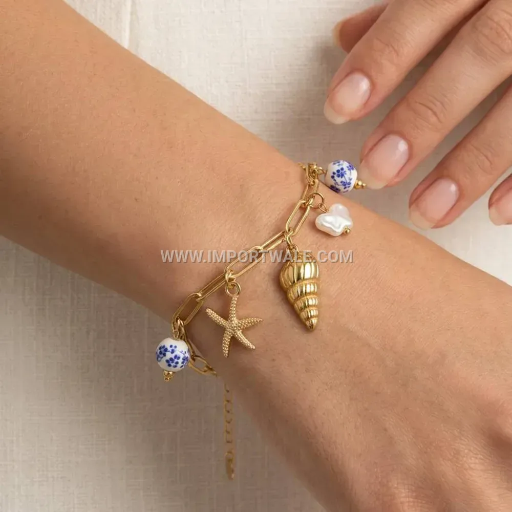 Zircon Starfish and Shell Motif Stainless Steel Bracelet