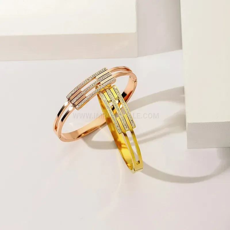 Designer Hollow Four Leaf Clover Stainless Steel Bangle