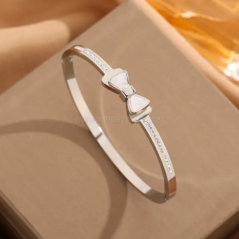 Double-Layer Faux Shell Bow Buckle Titanium Bangle