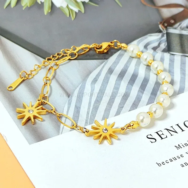 Faux Pearl and Starburst Gold Plated Charm Bracelet