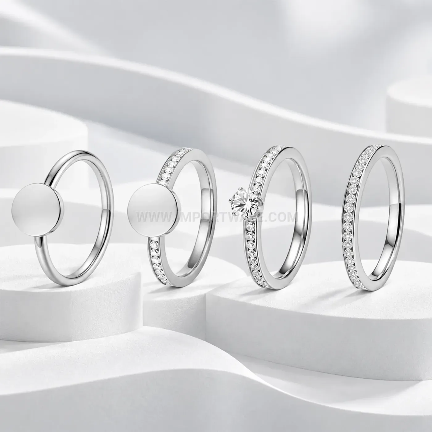 Four Piece Stackable Disc and Zircon Accent Ring Set