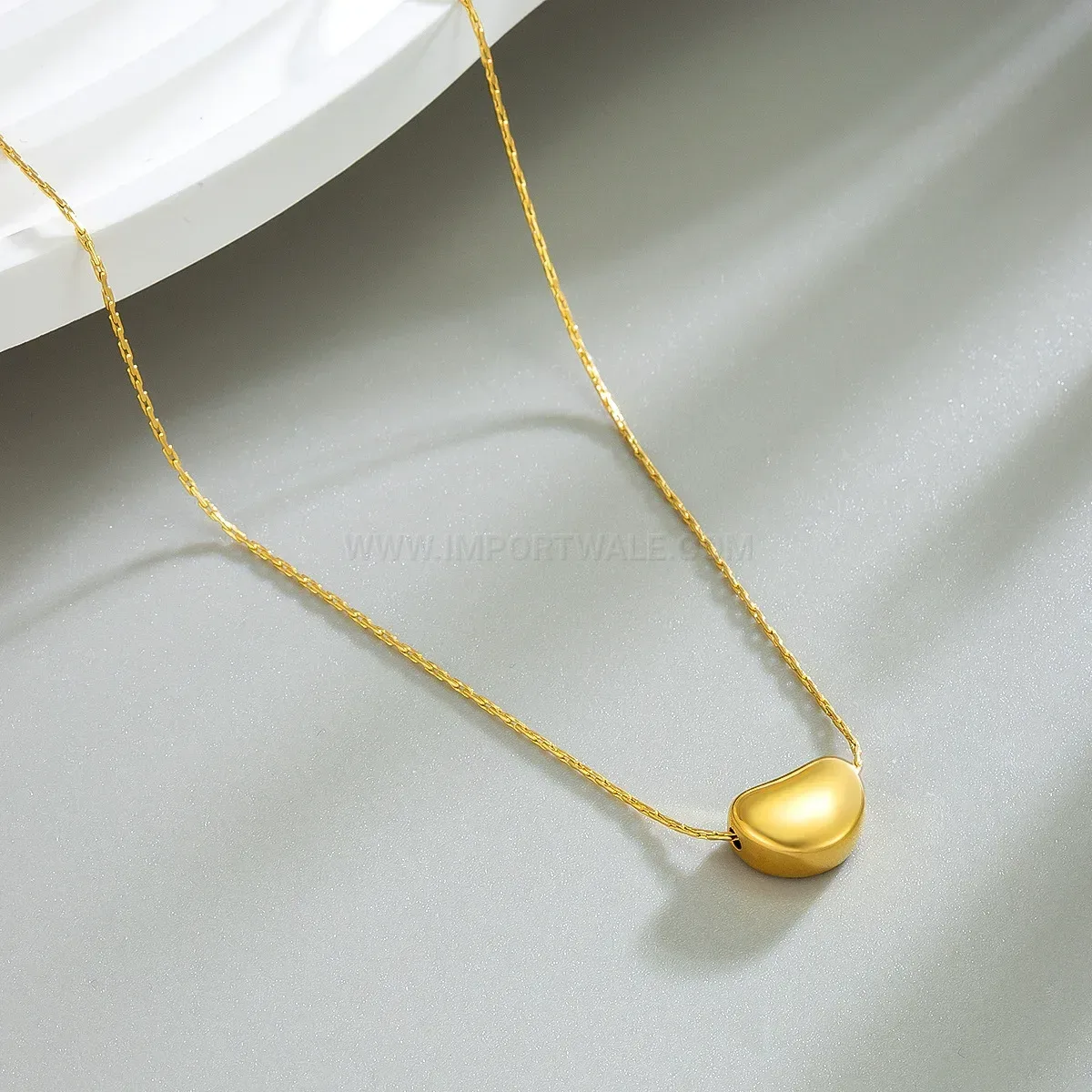 Elegant Minimalist Titanium Steel Love Bean Pendant Clavicle Necklace in Gold