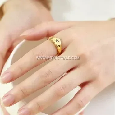 Eighteen Karat Gold Plated Stainless Steel Heart Starburst Ring